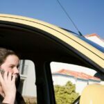 Wanneer Mag je op je Telefoon in De Auto